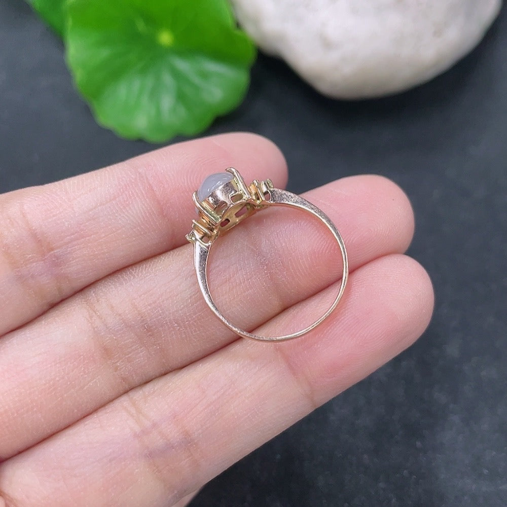 14k gold Jadeite and diamond ring with size 12, featuring a polished jade centerpiece and sparkling diamond accents.