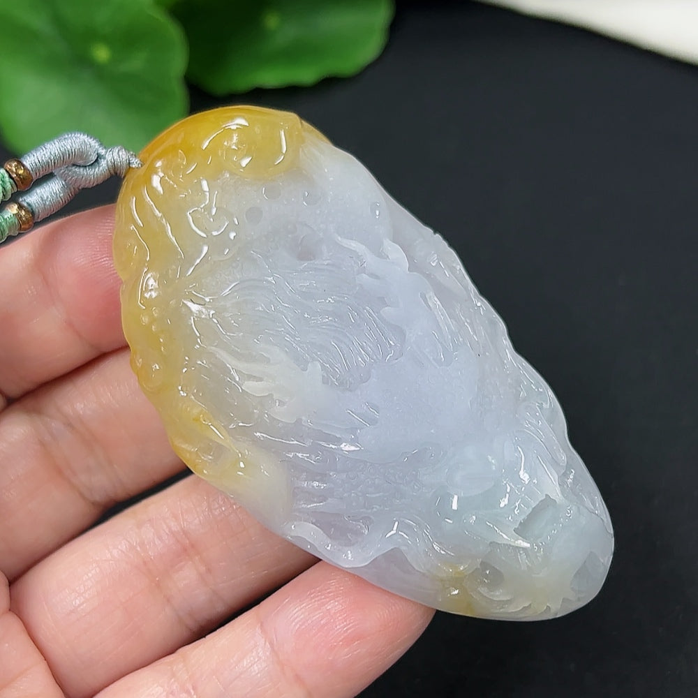 Jadeite dragon pendant with detailed carving, approximately 53.8g, featuring a rope cord, from HKHQ, natural green jade color.