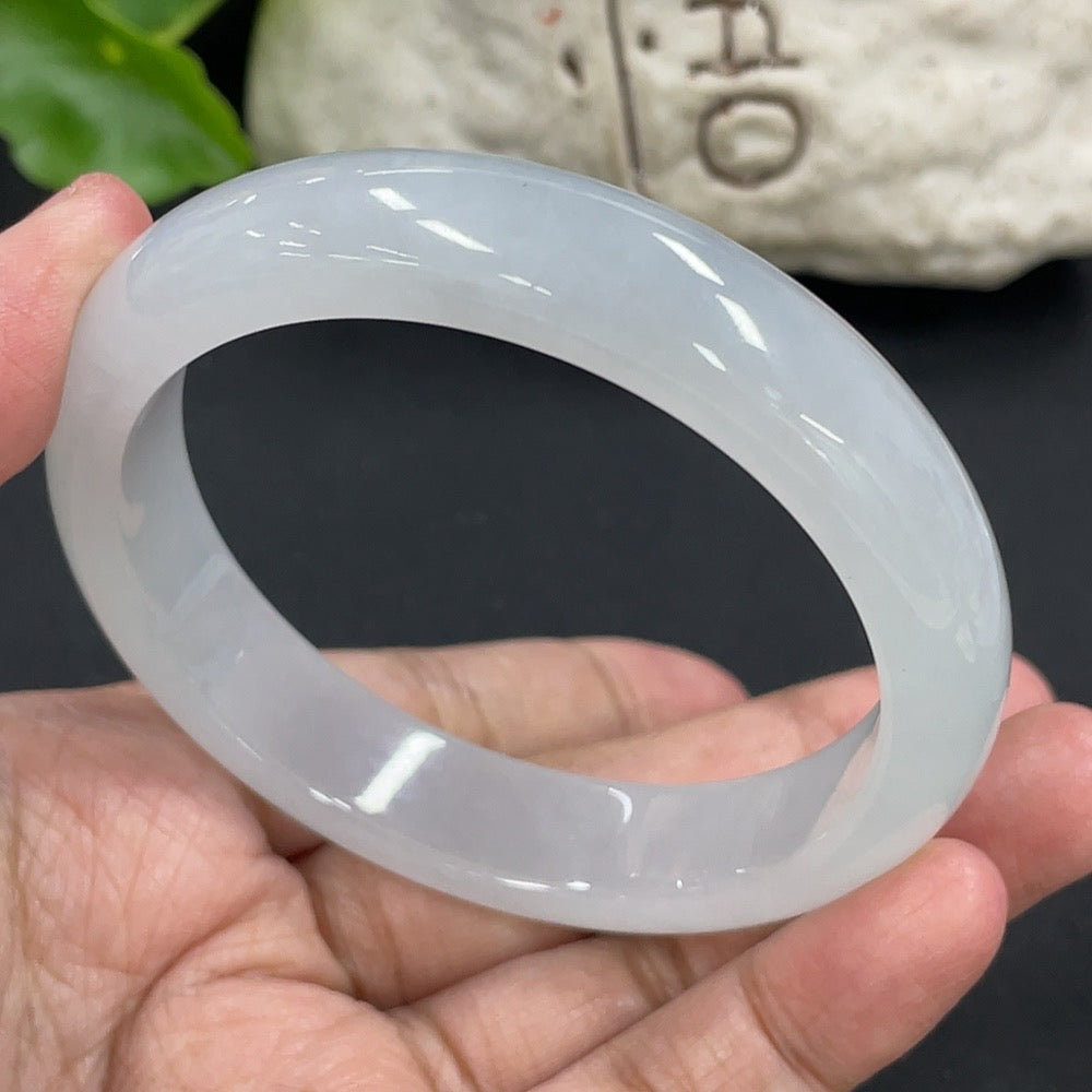 Jadeite round bangle bracelet with 57.5mm diameter, weighing approximately 58.27g, from HKHQ with smooth, polished surface.