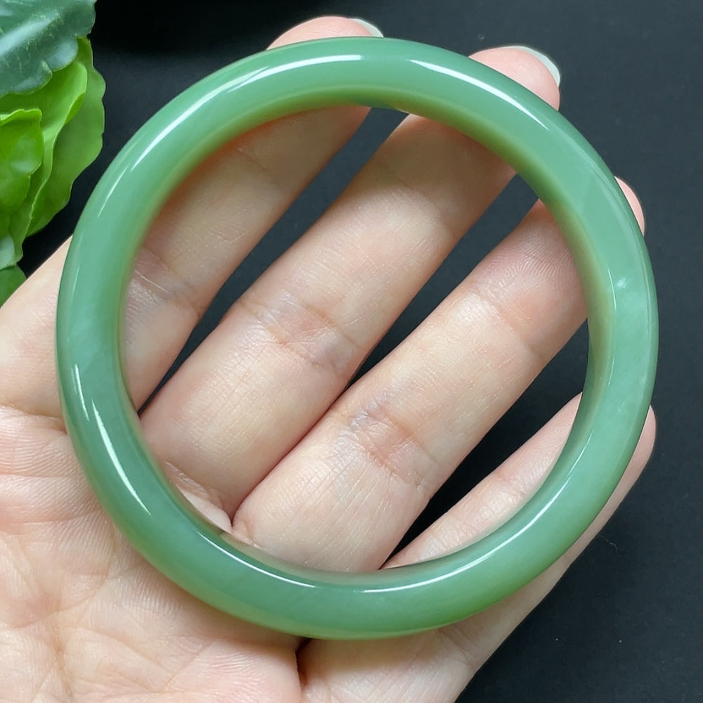 Hetian jade round bracelet with 56.1mm diameter, weighing approximately 44.72g, crafted by HKHQ, showcasing smooth, polished jade beads.