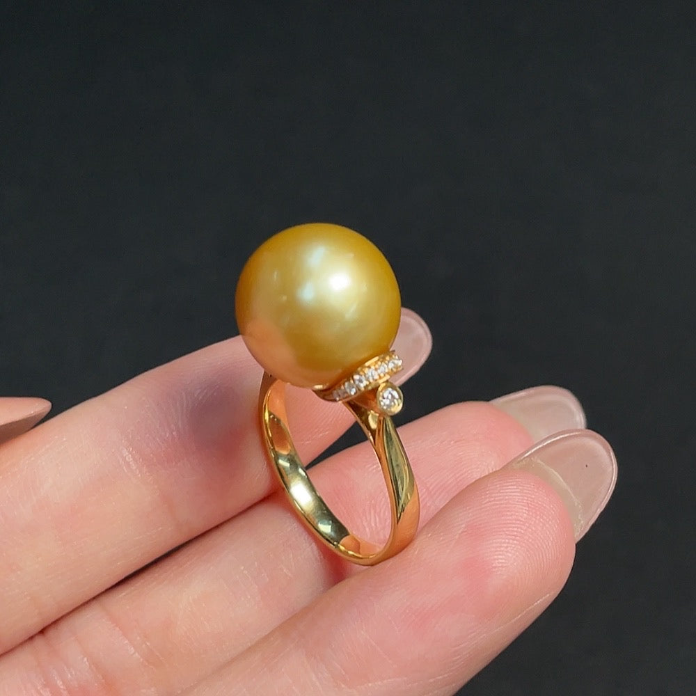 18K gold seawater pearl inlaid ring with diamonds, size 13, HKHQ, featuring a lustrous pearl and intricate gold setting.