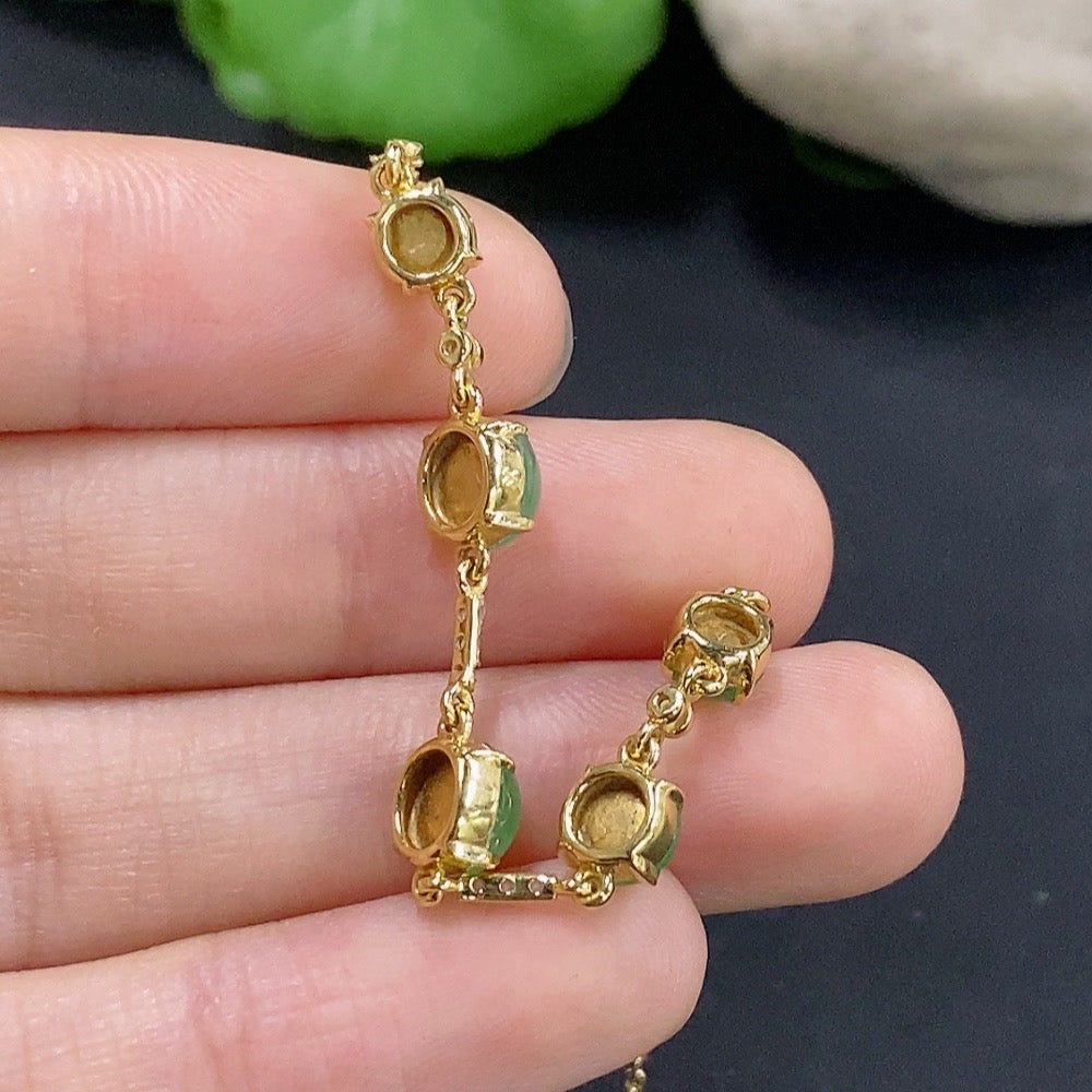 Elegant jadeite cabochon bracelet by HKHQ featuring 18k gold and diamond accents, with a total weight of 3.79 grams.
