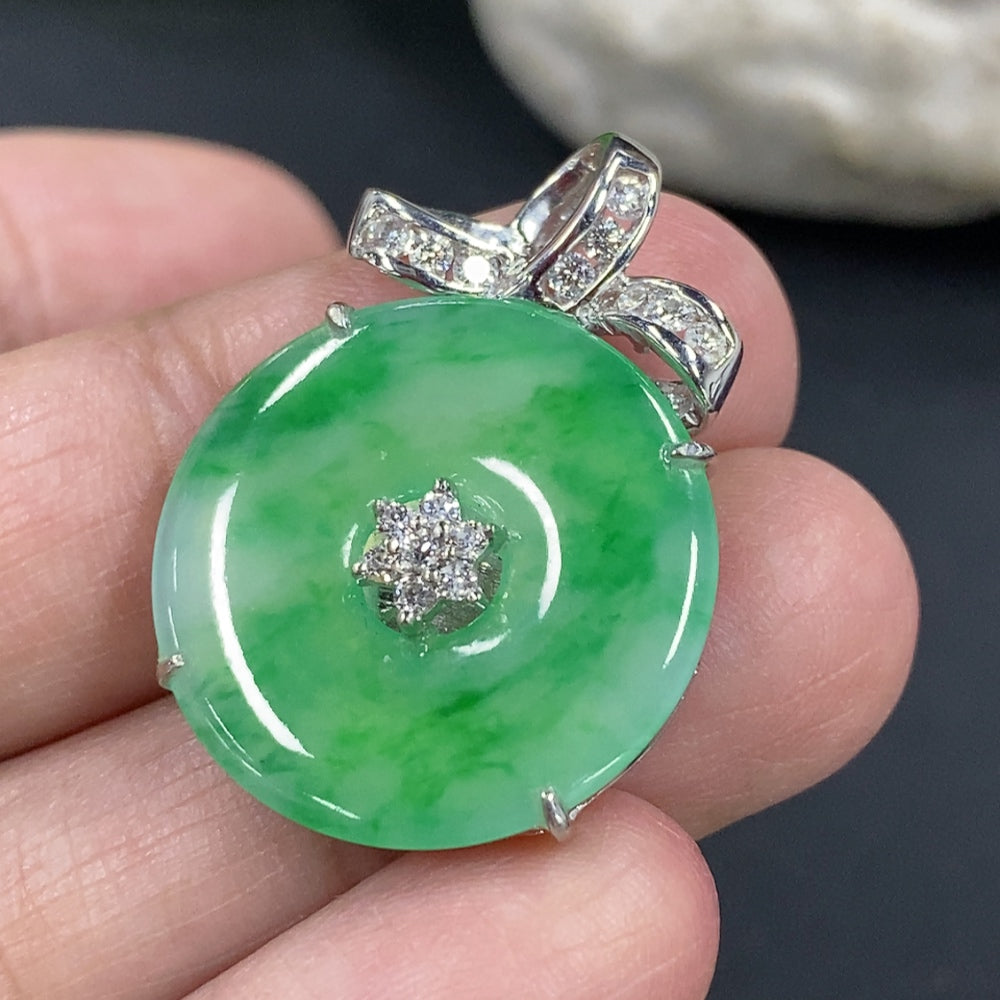 Jadeite Peace Knot pendant with diamond accents in 18k gold setting, elegant necklace by HKHQ, showcasing intricate design and craftsmanship.