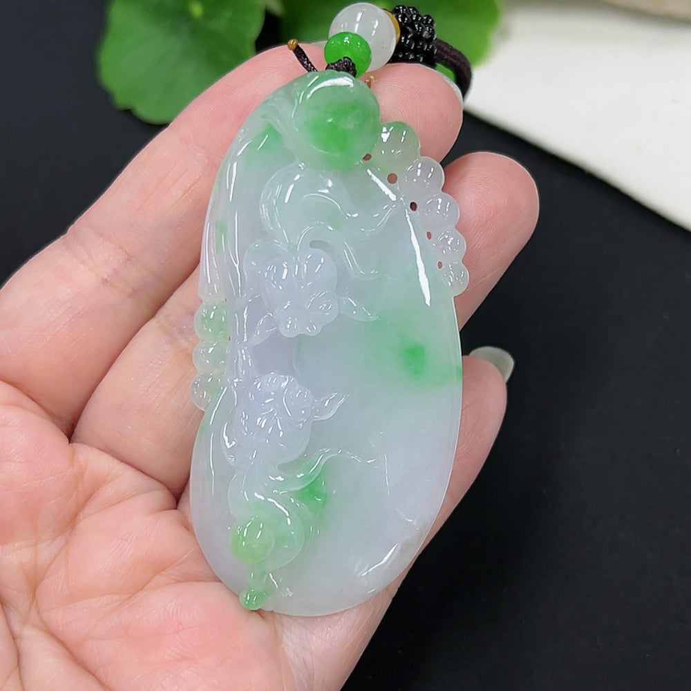Jadeite goldfish pendant with gold accents, weighing approximately 30.5g, featuring a detailed jade fish design on a rope.