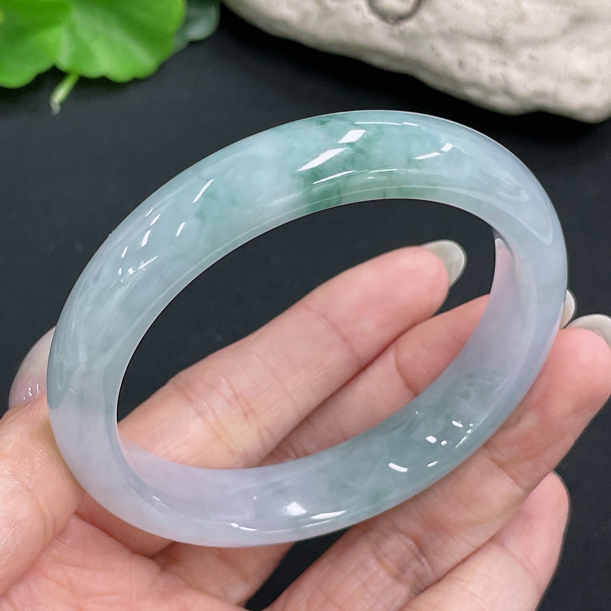 Jadeite round bangle with a total weight of 54.6g and size 56.3, featuring smooth, polished jadeite from HKHQ.