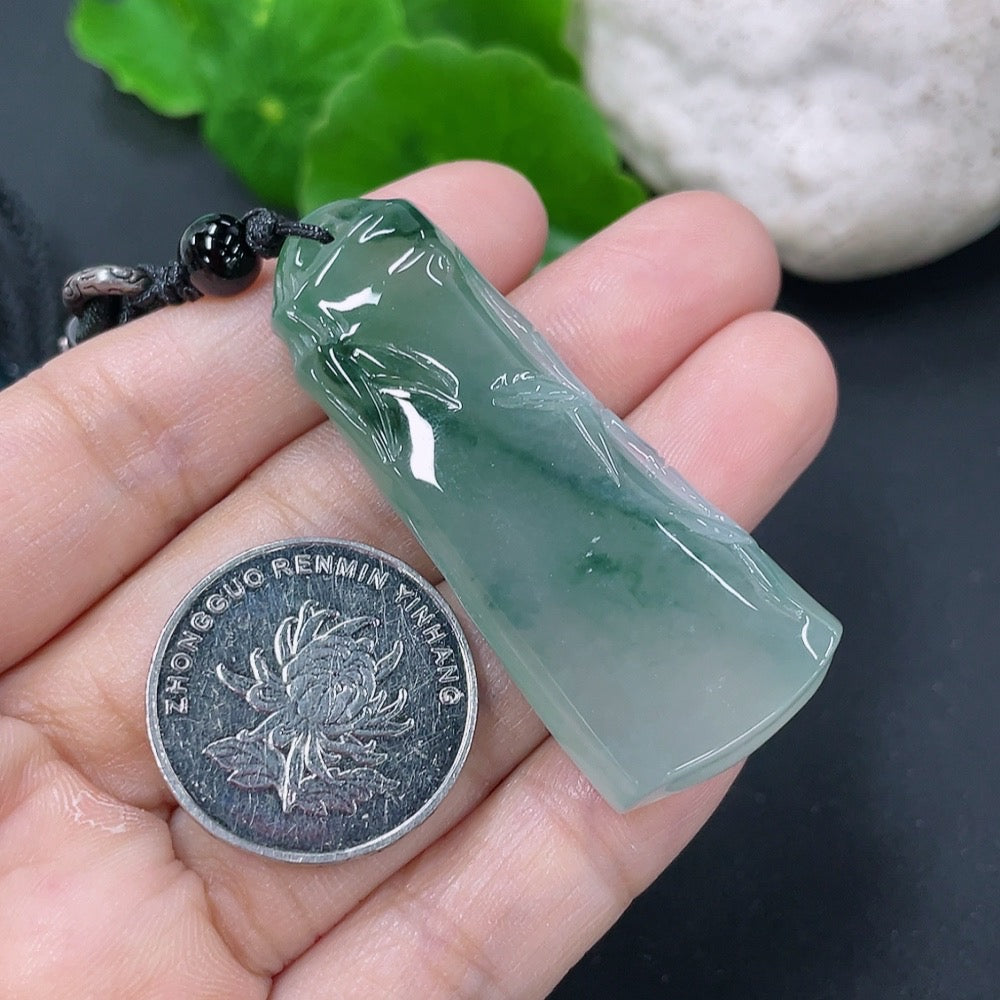Jadeite bamboo joint pendant necklace by HKHQ featuring a polished green jadeite pendant with bamboo design on a delicate chain