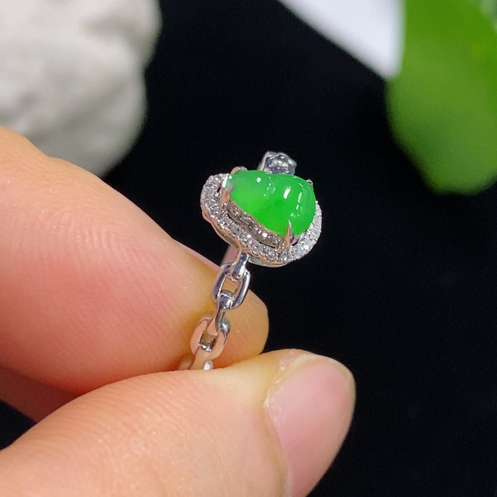 Jadeite ring with 18k gold and diamond accents, size 13, showcasing the elegant jade gemstone and intricate design.