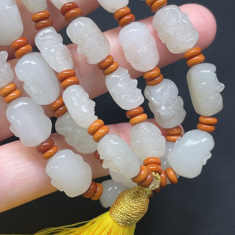 Hetian Jade Eighteen Arhats bracelet by HKHQ with beaded string, approximate weight 65.71g, featuring colorful, non-Hetian jade beads.