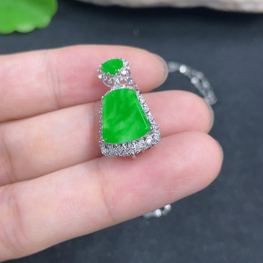 Jadeite plain pendant with 18K gold accents and diamond details, shown on a chain, weighs approximately 2.9 grams.