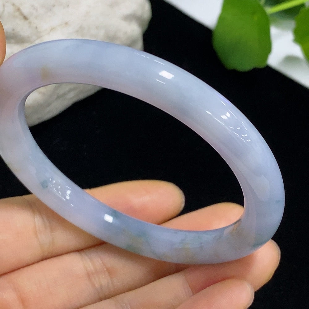 Jadeite round bangle with a total weight of 40.06g and size 55.6, featuring smooth, polished jadeite jade from HKHQ.