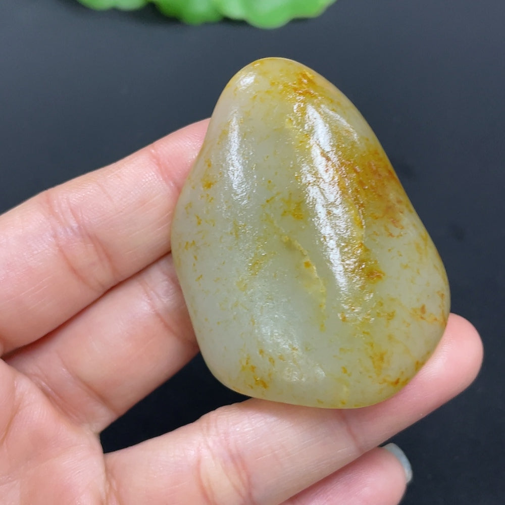 HKHQ Hetian Jade gemstone, approximately 41.6g, showcasing smooth, polished jade with a natural, undetermined skin color origin.