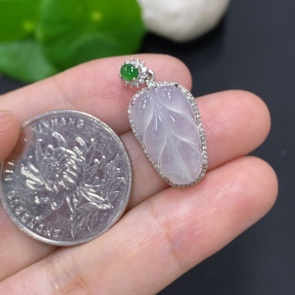 Jadeite leaf inlaid pendant with 18K gold and diamond accents, weighing approximately 2.5g, displayed on a neutral background.