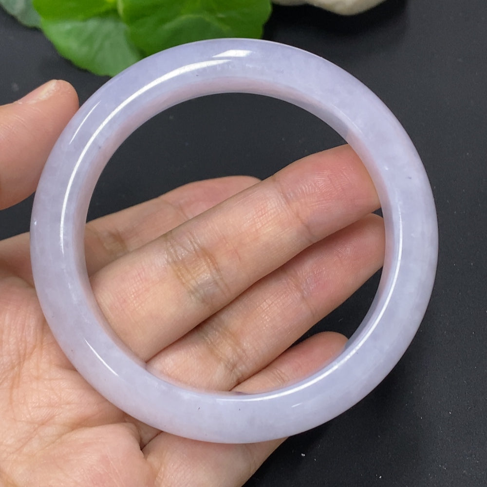 HKHQ jadeite round bangle, size 56.6, weighs approx. 67.5g, showcasing smooth, polished green jadeite bracelet with a glossy finish.