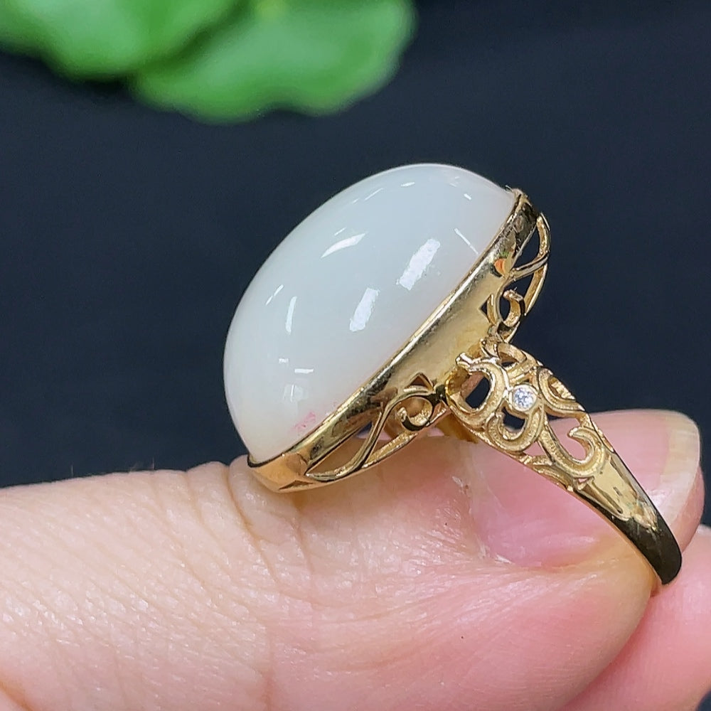 HKHQ Hetian Jade cabochon ring featuring inlaid jade stone and elegant silver band, showcasing detailed craftsmanship.