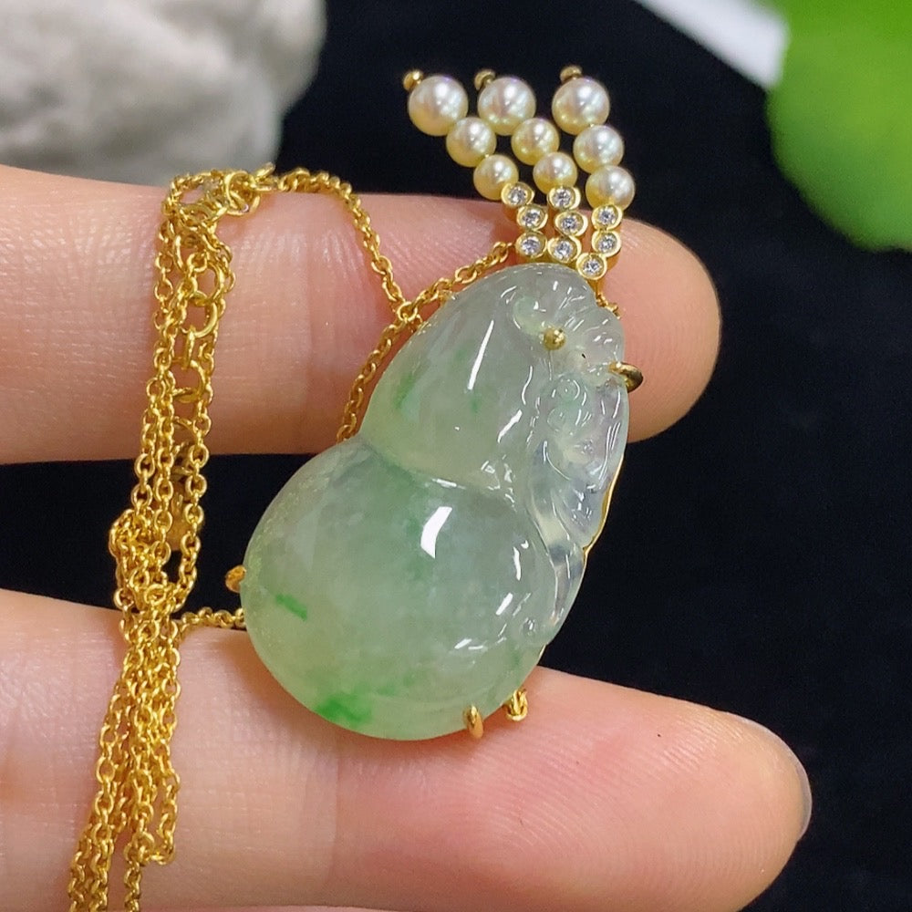 Jadeite gourd pendant set in 18k gold with diamond accents, total weight approximately 8.15g (including chain)