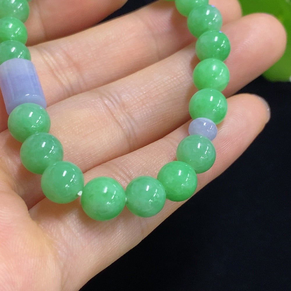 HKHQ jadeite bracelet with red beads, 7.3/5.2mm size, approximately 15.05g, showcasing smooth jade jewelry craftsmanship.