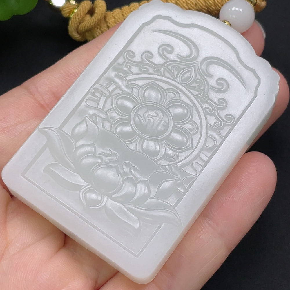 Heitian jade Guanyin pendant necklace with rope, featuring detailed carved figure, weighs approximately 71.37g.