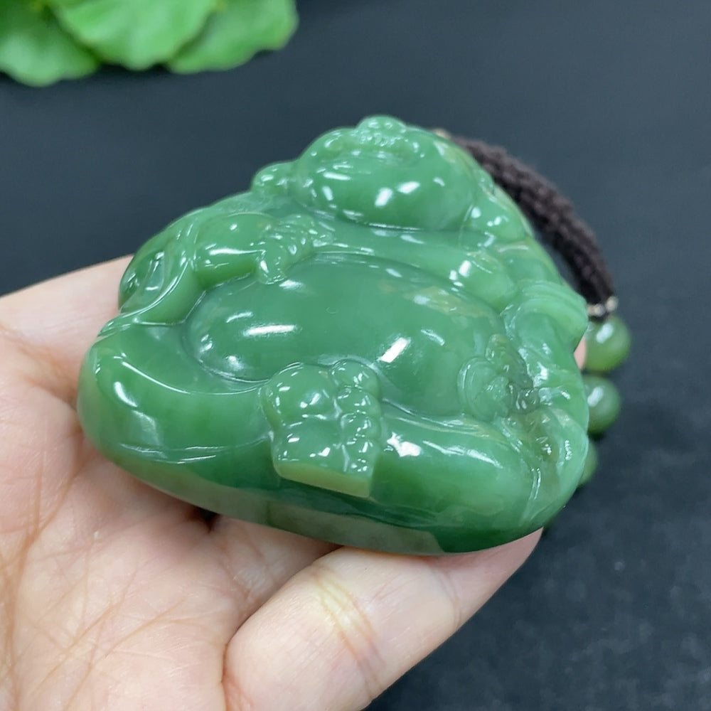 Hetian jade pendant featuring a Buddha design on a necklace, weighing 141.1g including the rope, from HKHQ.