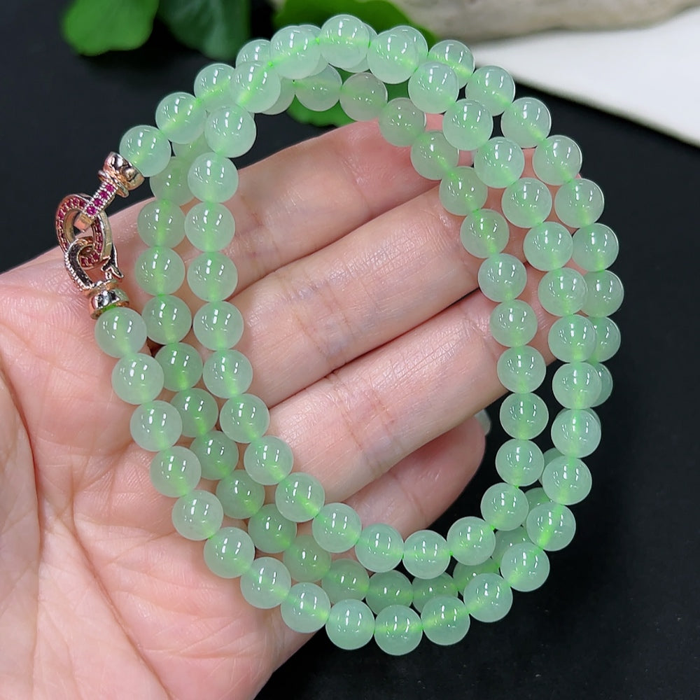 HKHQ jadeite bead necklace with 6.6mm beads, approximately 48.8g, non-gold inlaid, showcasing smooth, polished jade stones.