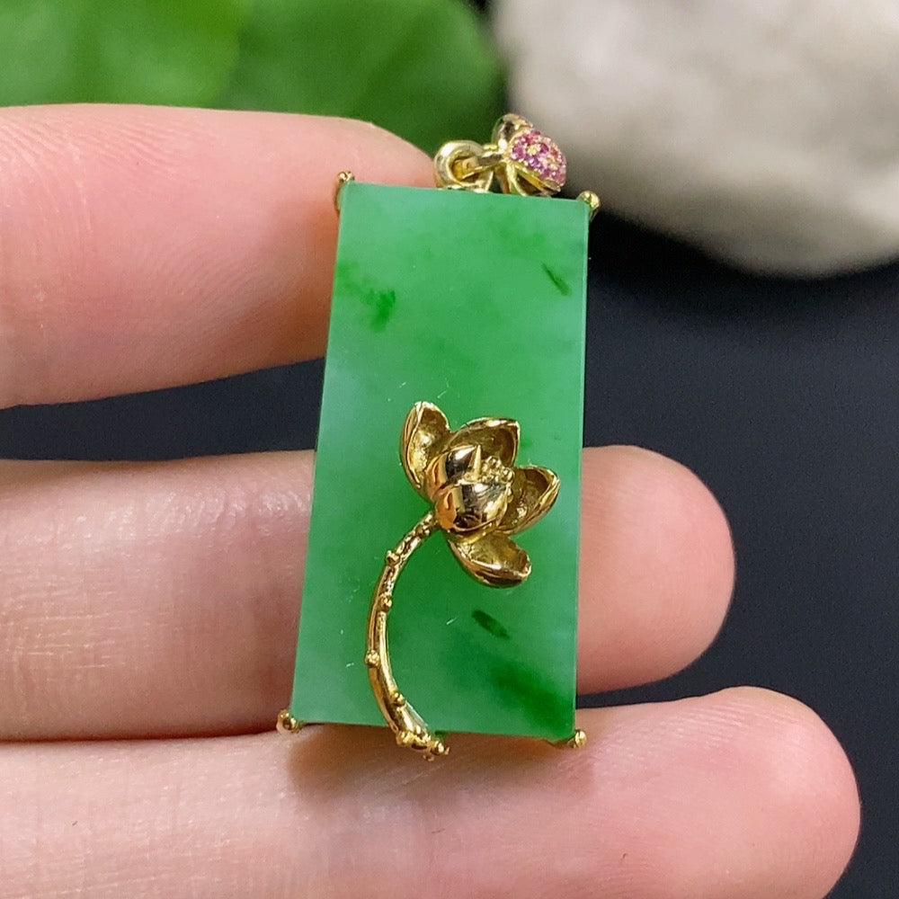 Elegant jadeite pendant with inlaid design, crafted by HKHQ, weighing approximately 7.1 grams, featuring vibrant green jade.