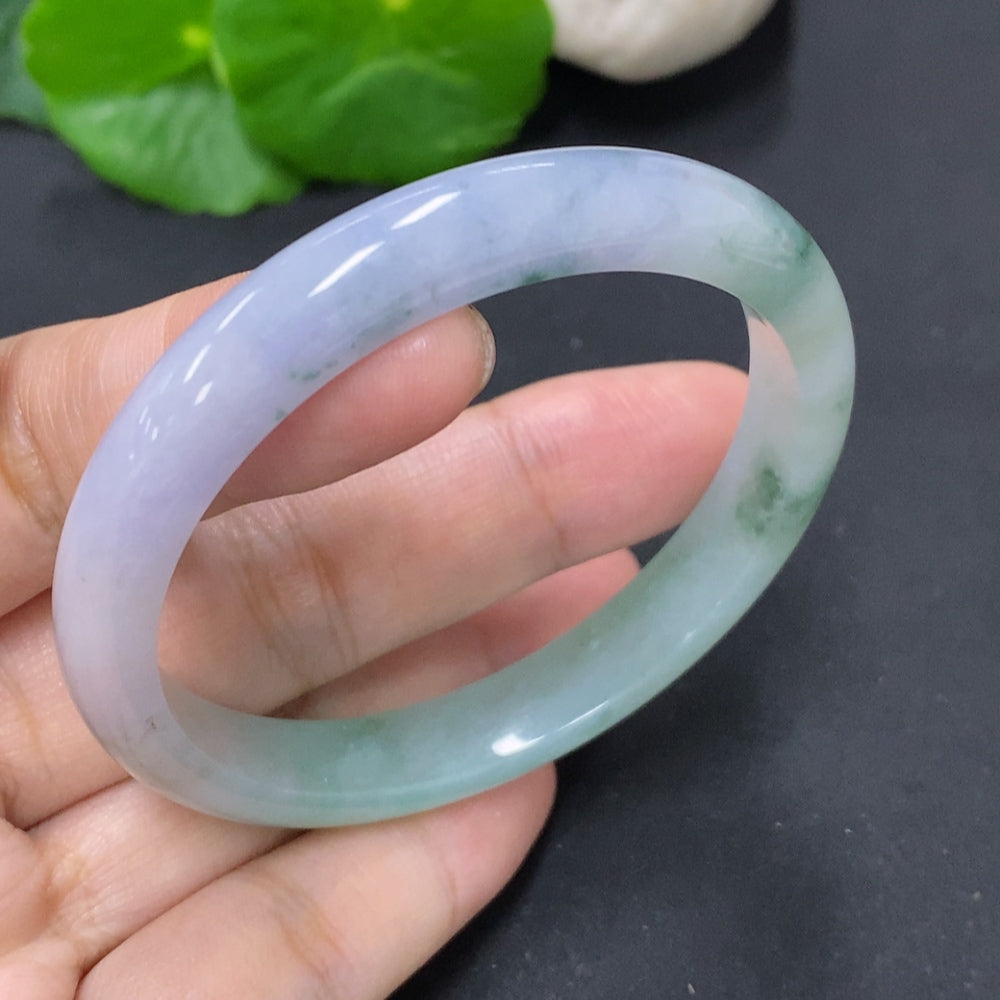 HKHQ jadeite round bangle, size 51.9, weighing approximately 28g, featuring smooth, polished green jade surface.