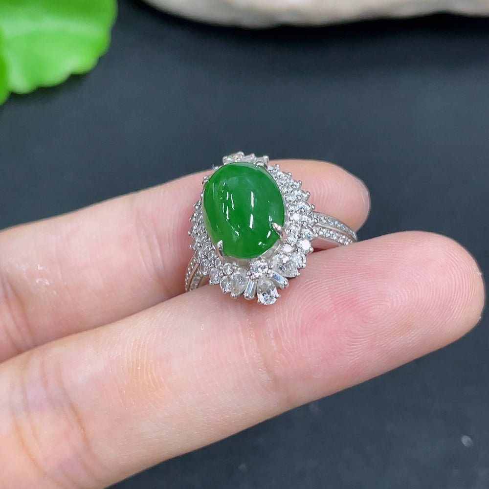 Elegant jadeite ring with 18k gold setting, weighing approximately 5.7g, size 14, from HKHQ featuring a smooth polished surface.