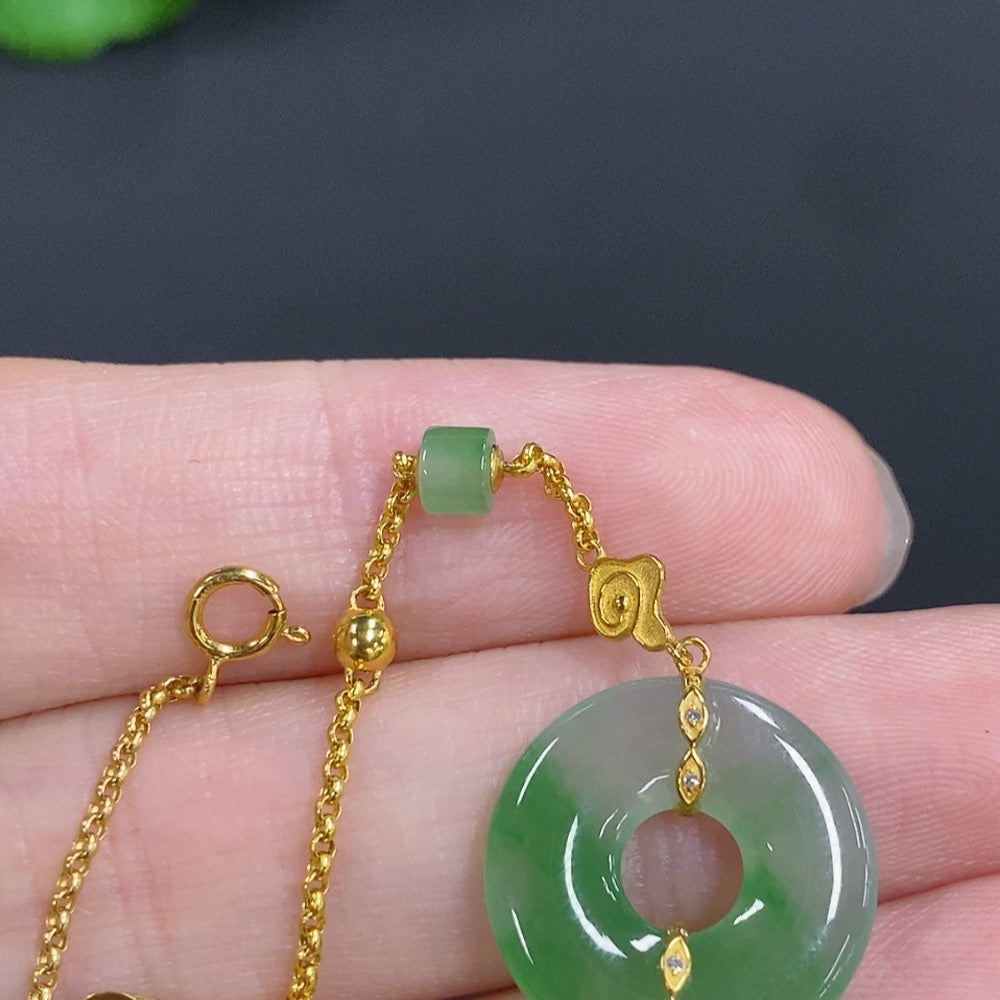 HKHQ Jadeite donut inlay bracelet with 18k gold and diamond accents, featuring a jade gemstone and delicate design.