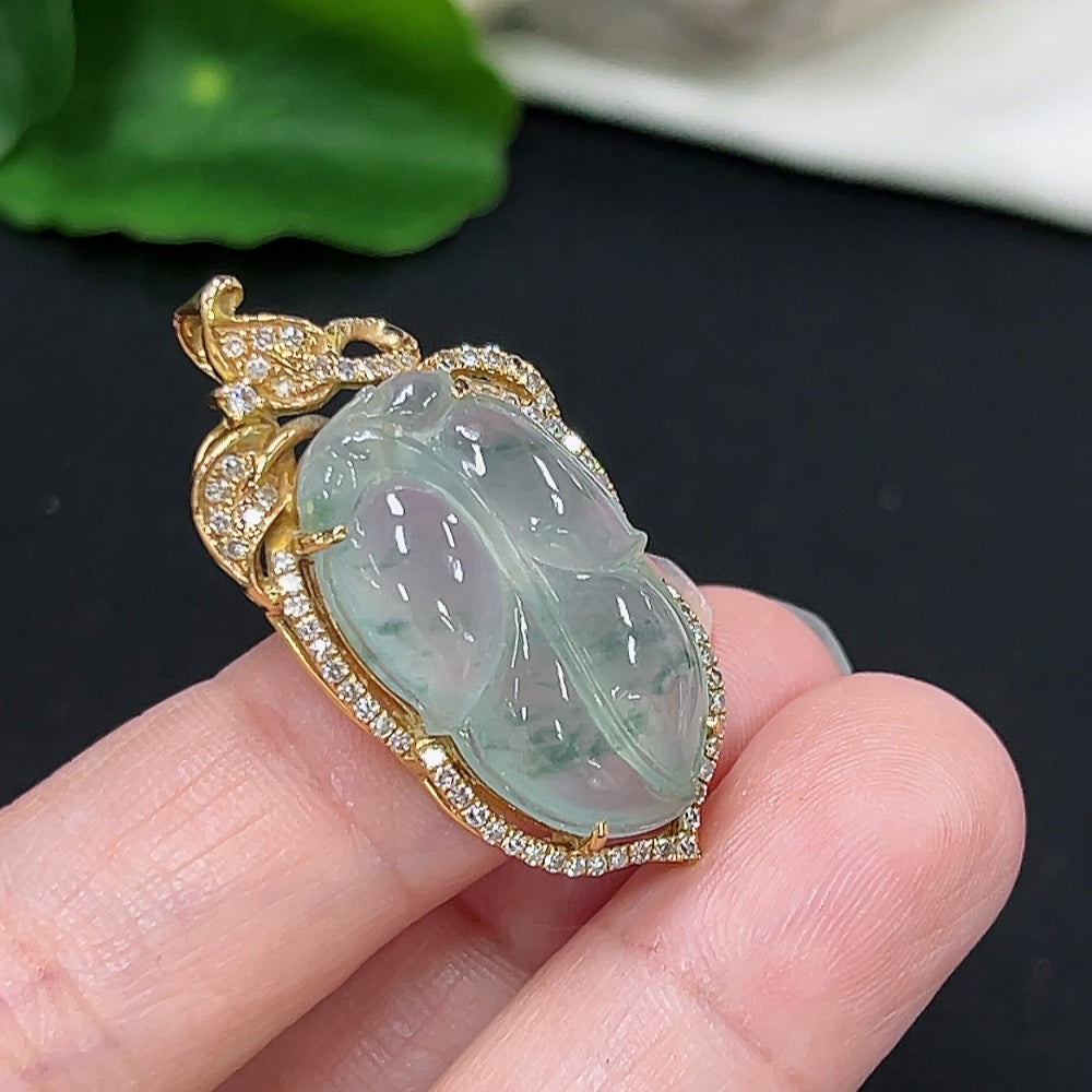 Jadeite leaf inlay pendant with 18K gold and diamond accents, weighing approximately 6.6g, featuring detailed natural jade craftsmanship.