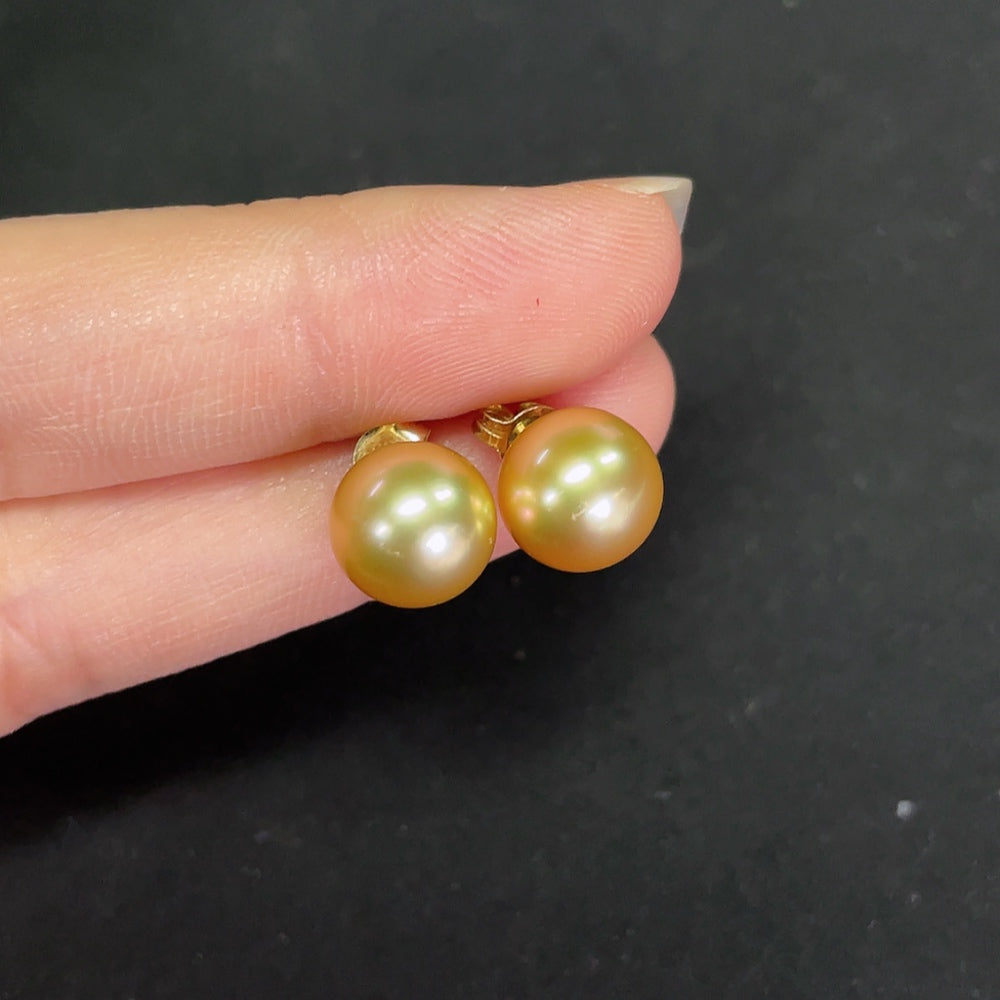 Saltwater pearl stud earrings with 14K gold setting, featuring round pearls approximately 9.3mm in size.