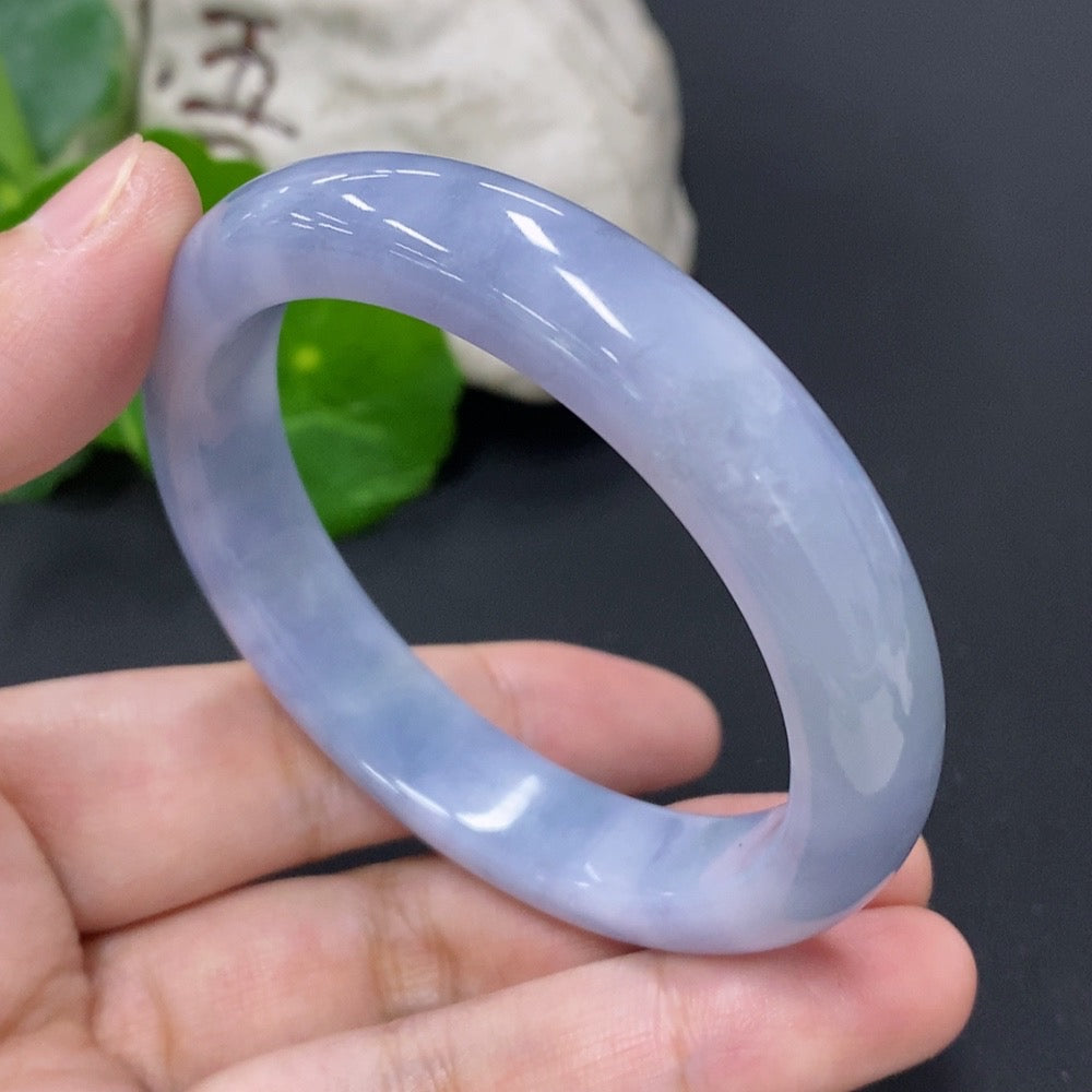 Jadeite round bracelet with a total weight of 46.4g and size 52, featuring smooth, polished green jade beads.