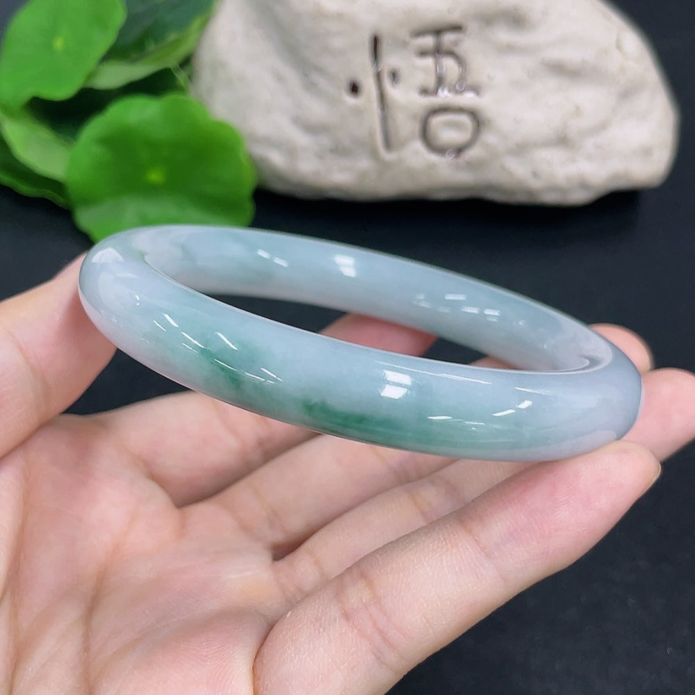 Jadeite round bangle by HKHQ, 65.9g weight, size 57.4, featuring smooth polished jadeite surface and circular design.