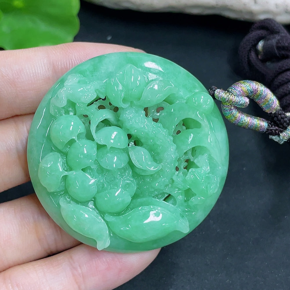 HKHQ jadeite lotus pendant necklace featuring a detailed lotus design and a 48.61g weight, shown with the rope.