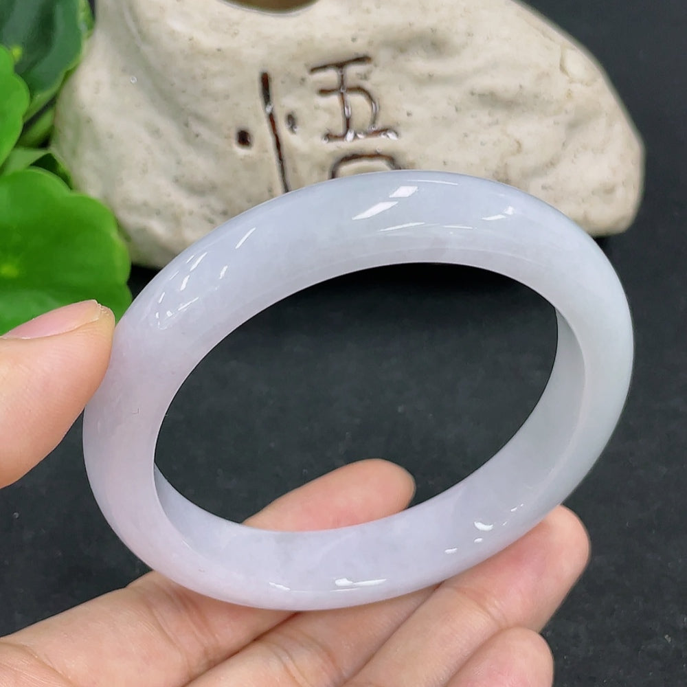 HKHQ jadeite round bangle in size 55.8 with a weight of 52.4g, showcasing smooth, polished jadeite craftsmanship.