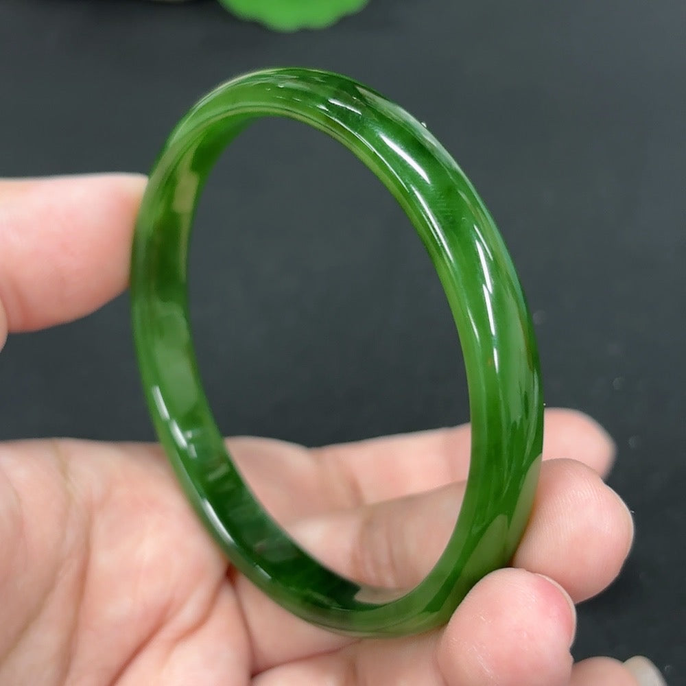 Green Hetian Jade round bracelet with smooth beads, HKHQ brand, size 57.2mm, total weight approx. 20.4g, showcasing elegant craftsmanship.