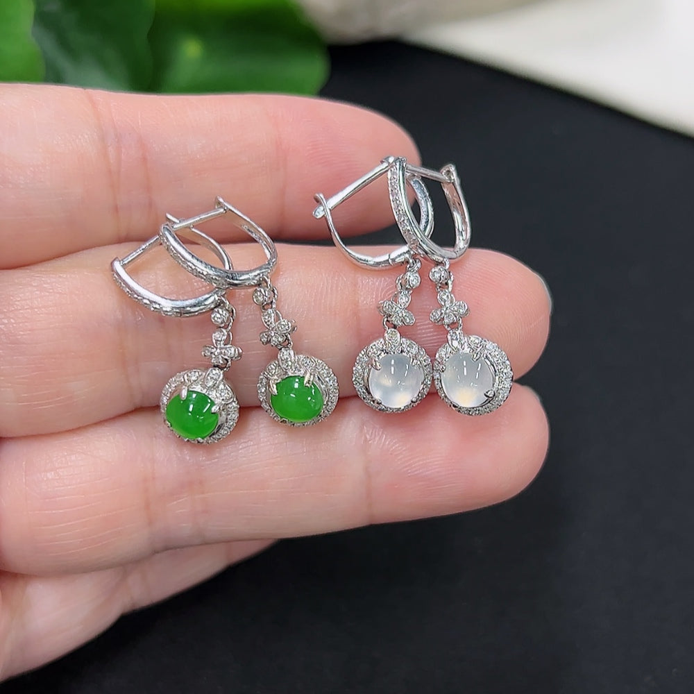HKHQ jadeite inlaid earrings with 18K gold and diamond accents, showcasing elegant jewelry design and craftsmanship.