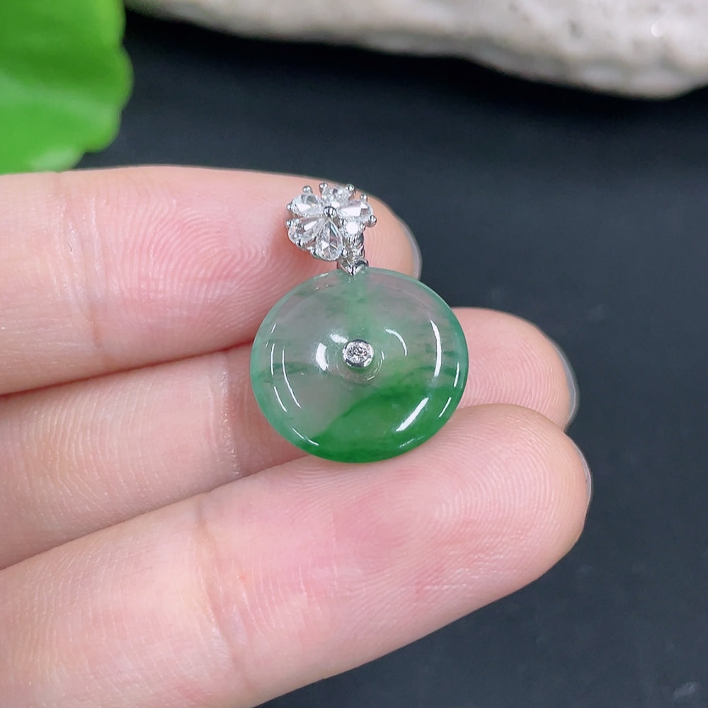 Jadeite pendant with 18K gold and diamond accents, delicate jewelry piece showcasing green jade, gold, and sparkling stones.