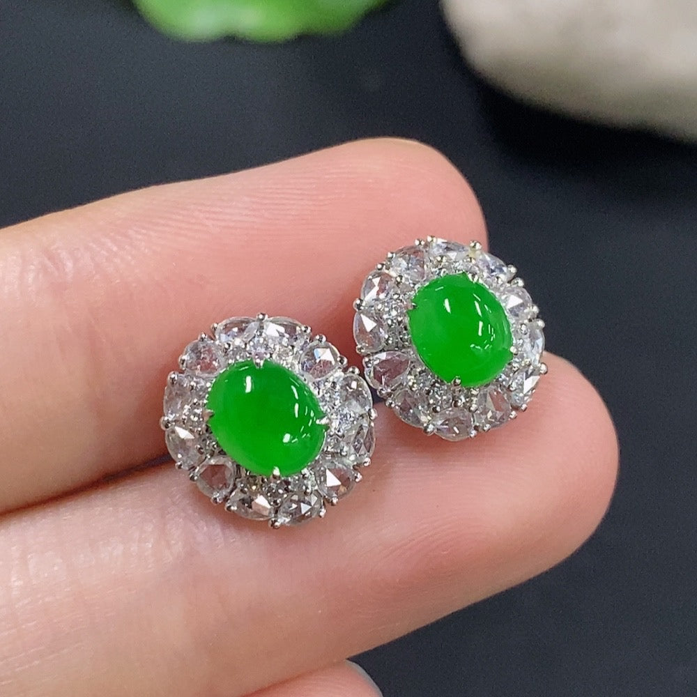 HKHQ jadeite earrings with 18k gold and diamond accents, showcasing smooth green jade stones and elegant gold details.