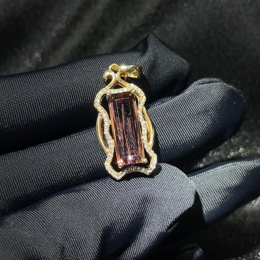 Tourmaline inlaid pendant with 18k gold setting, featuring vibrant gemstones, weighing approximately 2.88 grams.