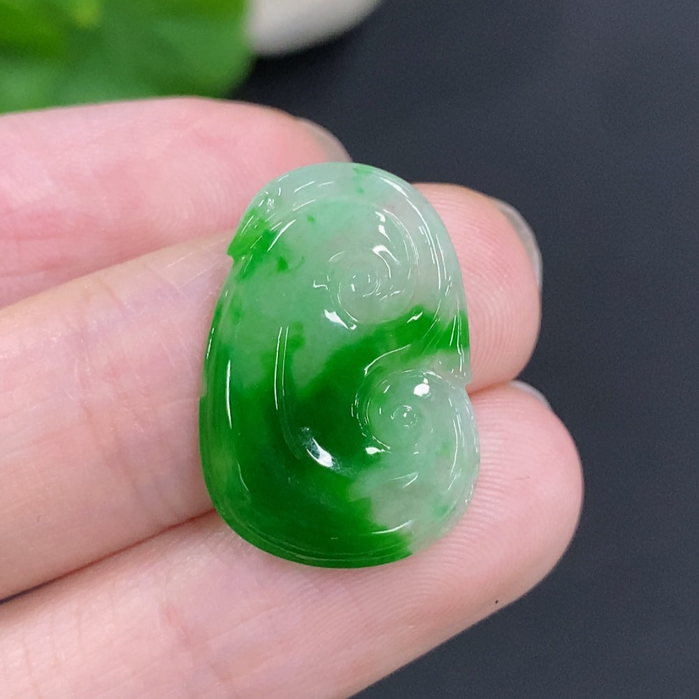 Jadeite Ruyi inlaid piece by HKHQ, weighing approximately 1.4g, showcasing intricate jade craftsmanship.