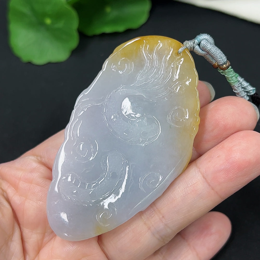 Jadeite dragon pendant with intricate carved design, weighing approximately 53.8g, attached to a rope, from HKHQ.