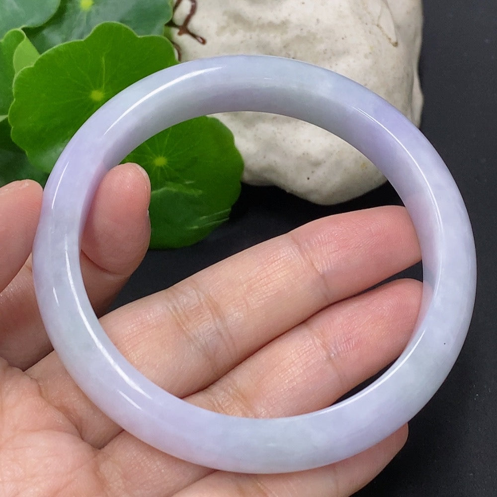 Round jadeite bangle weighing 54.8g, size 59.7, crafted by HKHQ, showcasing smooth, polished green jade jewelry.