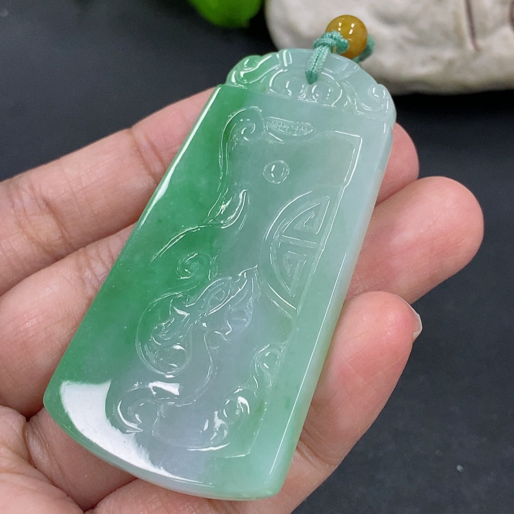 Antique jadeite pendant on necklace, weighing approximately 32g, featuring a smooth, polished jadeite gemstone from HKHQ.