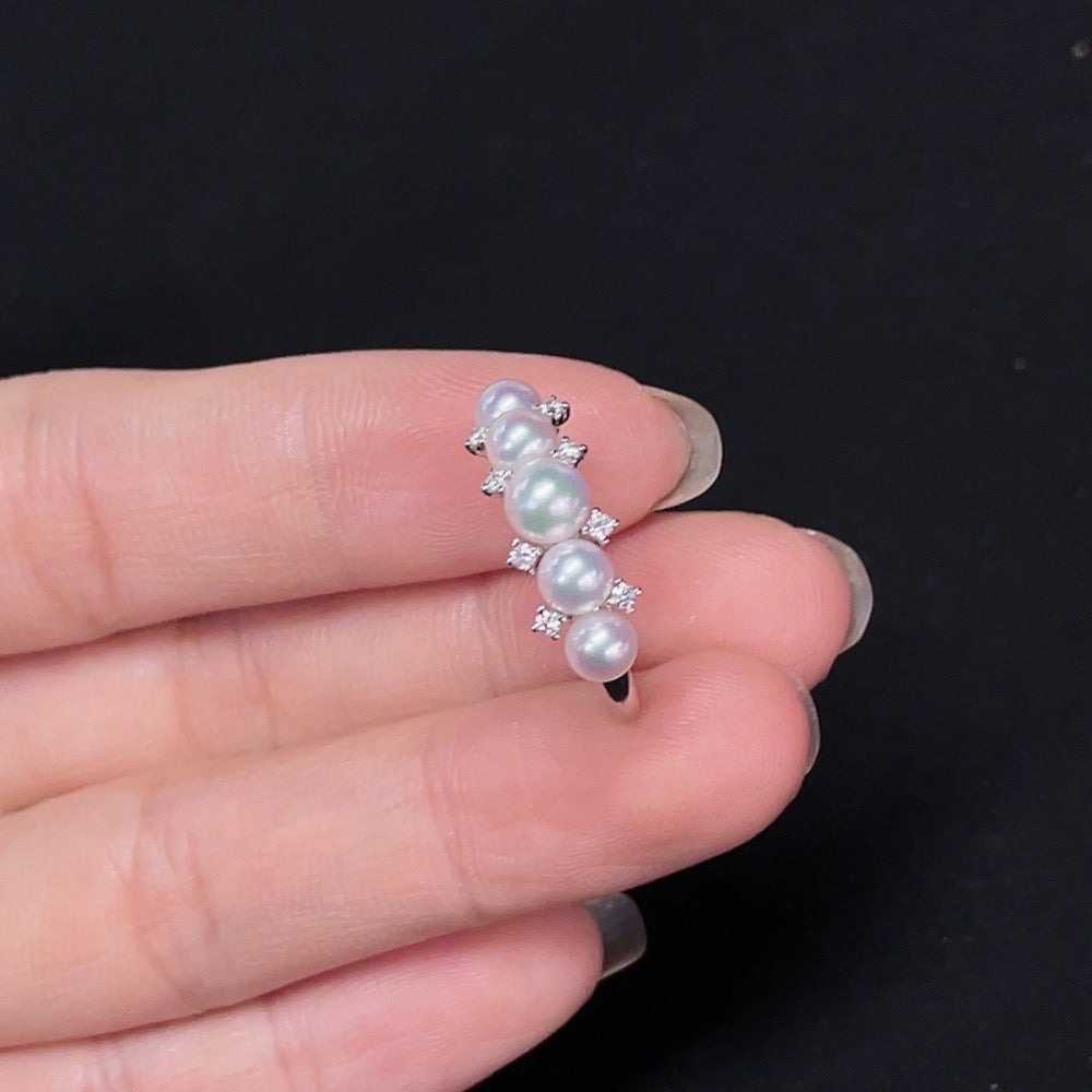 Seawater pearl ring by HKHQ featuring 18K gold, diamond accents, size 13, with 3.9-4.7mm pearls, weighing approx. 2.29g