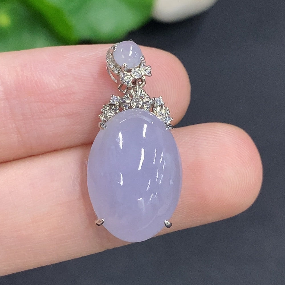 Jadeite cabochon pendant with 18K gold, non-diamond (too small to determine natural origin)