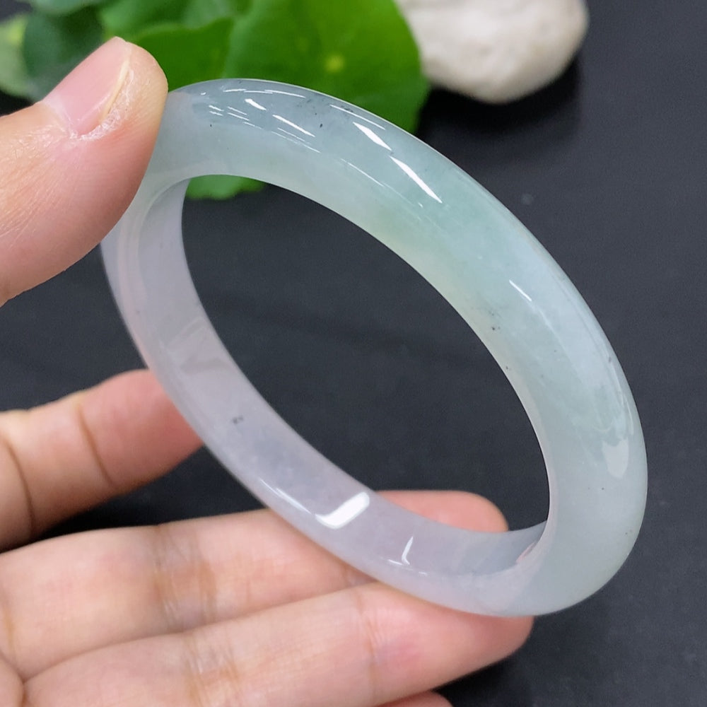 Jadeite round bangle in size 56.7 with a total weight of 44g, showcasing smooth, polished green jade from HKHQ.