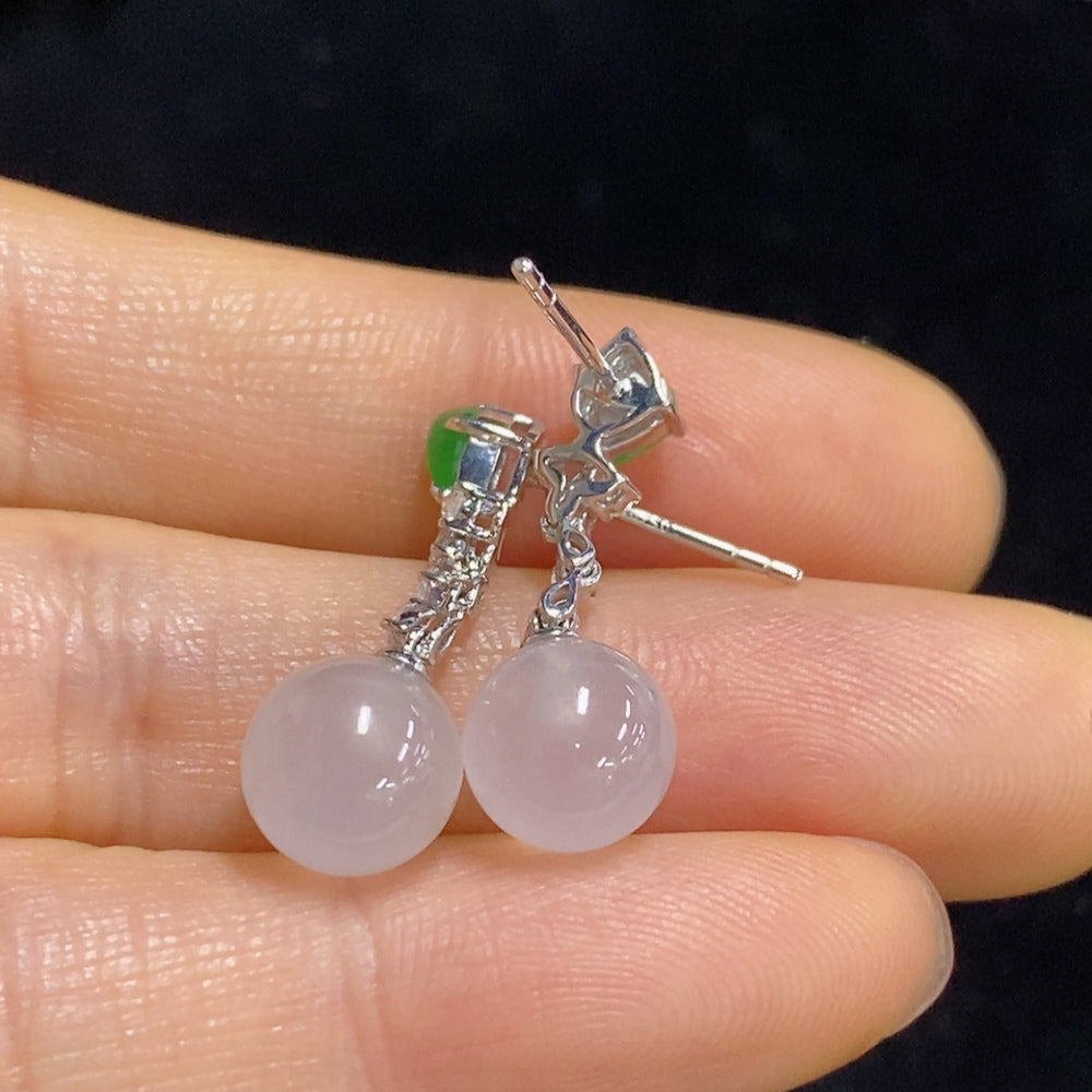 Jadeite earrings set in 18K gold with diamond accents