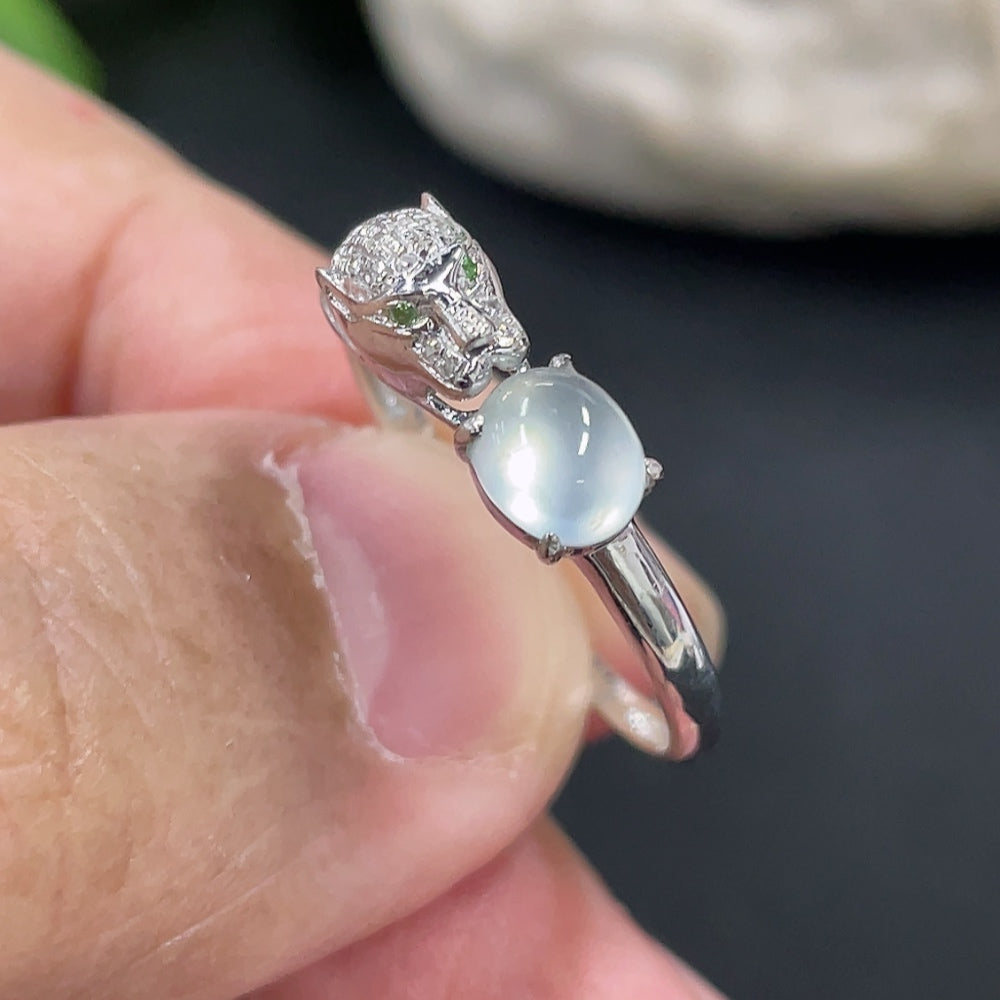 Jadeite cabochon ring with 18K gold band and diamond accents, size 14, featuring a polished green jade stone and intricate inlay.