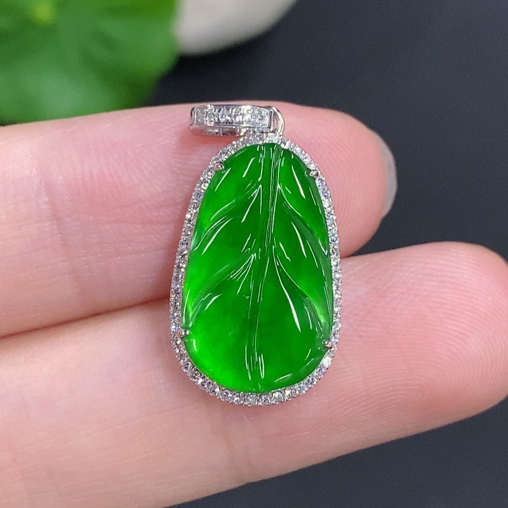 Jadeite leaf pendant with 18k gold, diamond accents, HKHQ jewelry, featuring a detailed jade leaf design.
