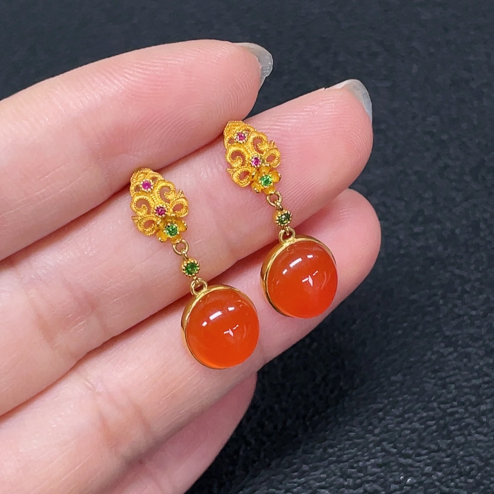 Red Agate gemstone earrings by HKHQ with 18K gold settings and non-natural accent stones, weighing approximately 2.95g.
