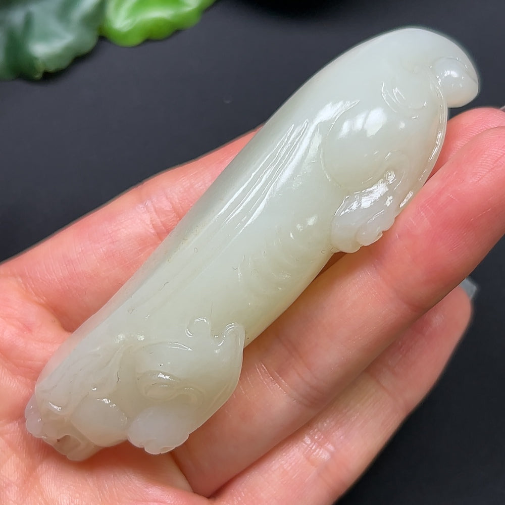Heitian jade Pixiu pendant from HKHQ, carved with intricate details, weighs approximately 80g, showcasing traditional jade craftsmanship.